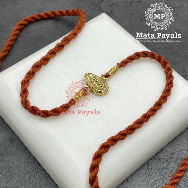 Amiable Gold Plated Silver Rakhi
