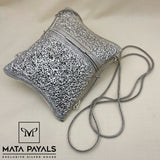 Intricate Hand Carved Sling Bag
