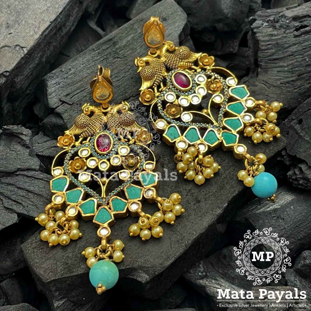 Unimaginable Dual Peacock Gold Plated Chandbali
